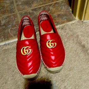 been worn  one time Gucci leather and canvas espadrilles, with brand shoe box.